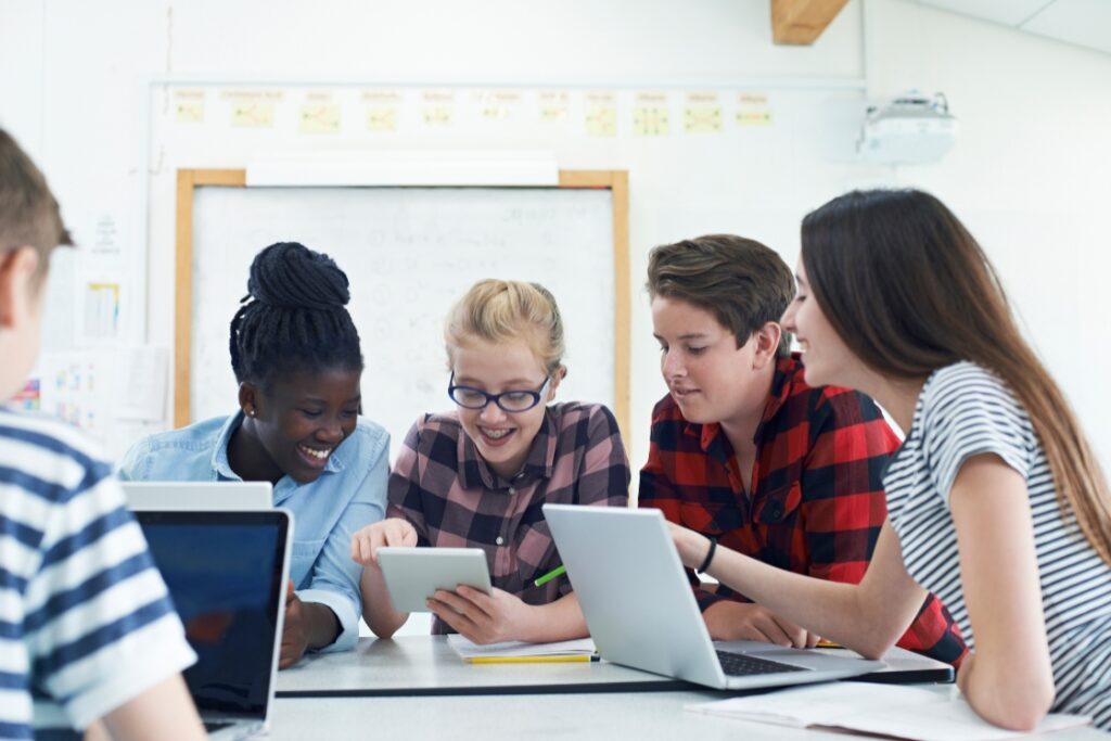 Teen EFL students working together